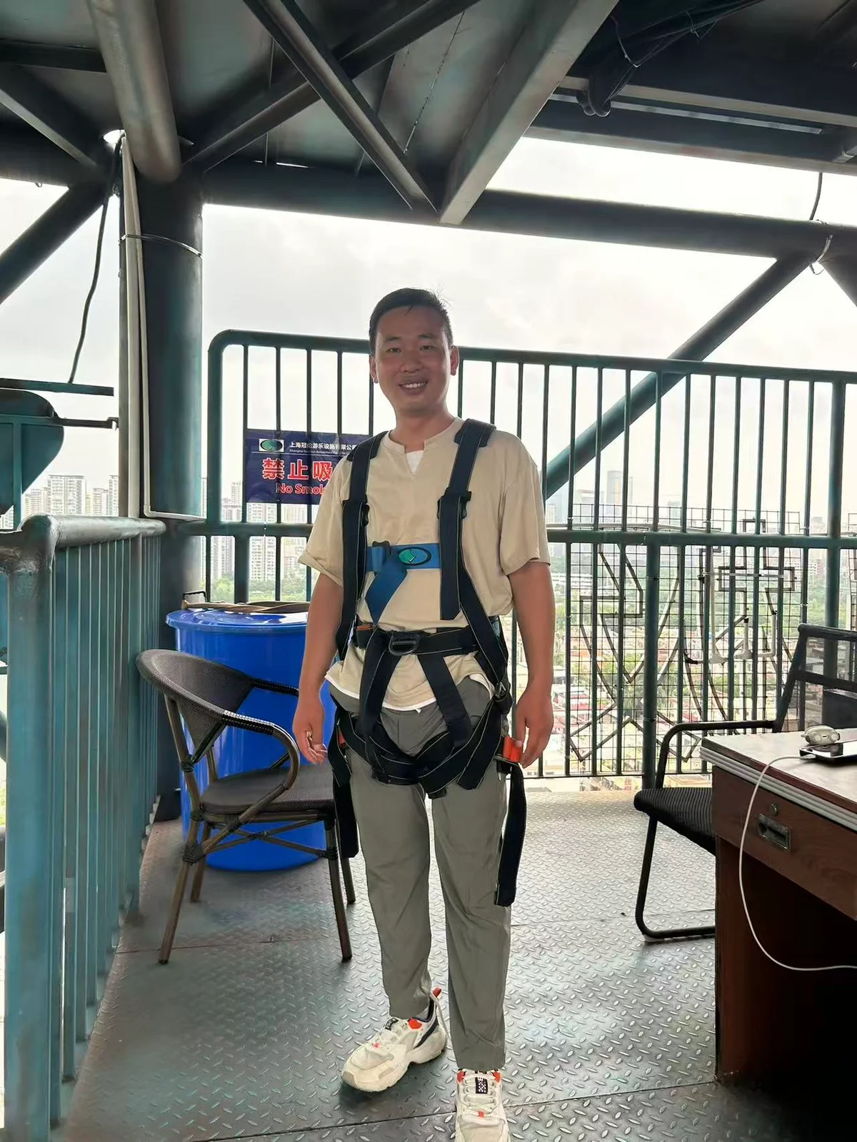 Yan Xin preparing for a bungee jump before deciding to begin the TOOLAZO venture with Qingheng Wu